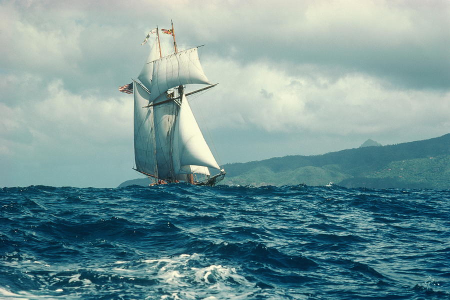 Sailboat in rough seas, St. Lucia, Carribean Photograph by Greg Pease