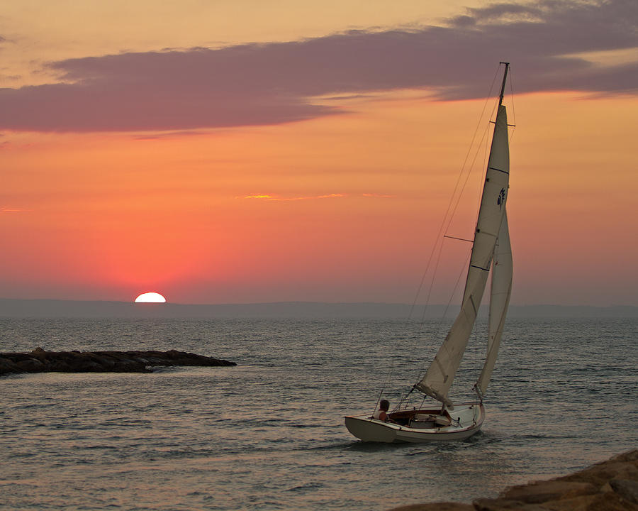 Sailboat sunset Photograph by Jack Nevitt