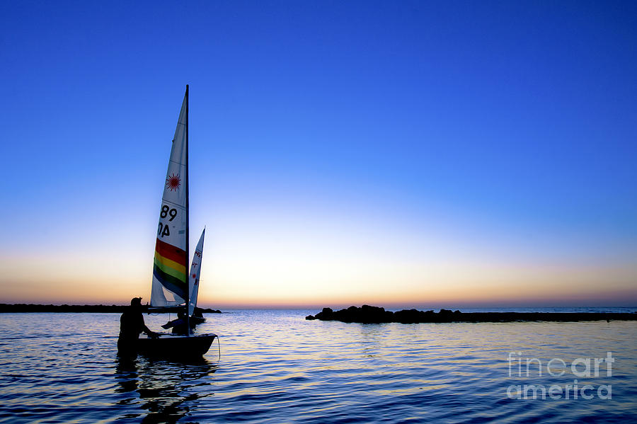 Sailboats at sunse Photograph by Nir Ben-Yosef