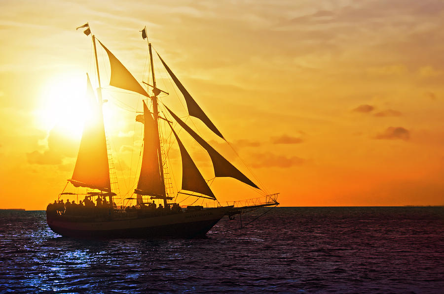 Sunset Photograph - Sailing at Sunset by Alida Thorpe