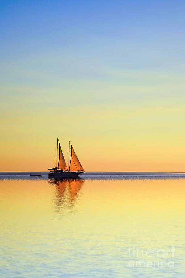 Sailing Boat on a Tropical Ocean at Twilight Photograph by Colin and Linda McKie