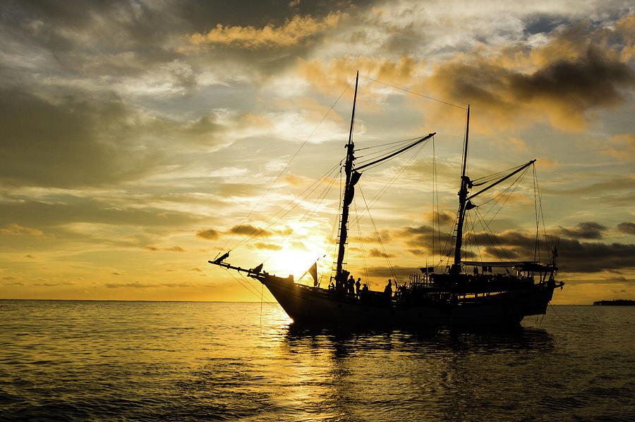 Sailing Boat On Sunset Photograph by Chris Immler