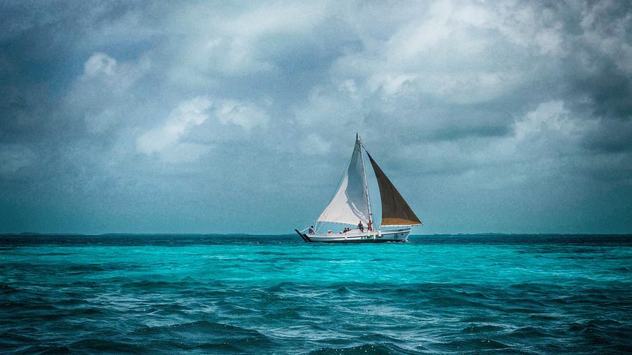 Boat Photograph - Sailing in Blue Belize by Kristina Deane