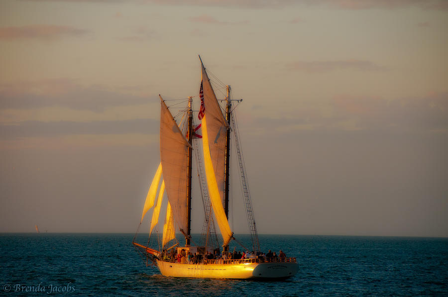 Sailing into the Sunset Photograph by Brenda Jacobs