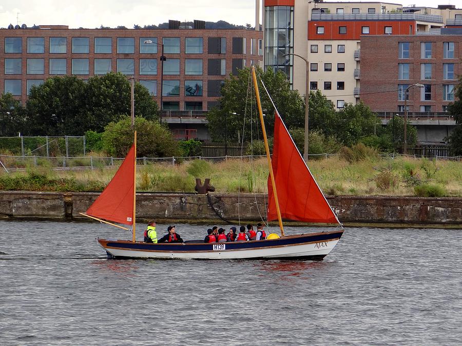 Sailing the Docklands Photograph by Keith Stokes