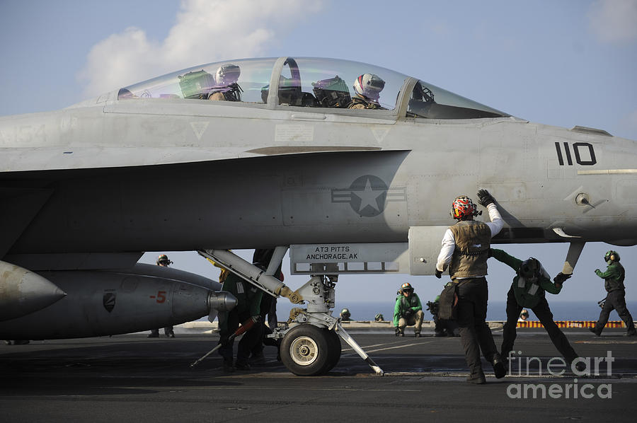 Transportation Photograph - Sailors Check An Fa-18f Super Hornet by Stocktrek Images