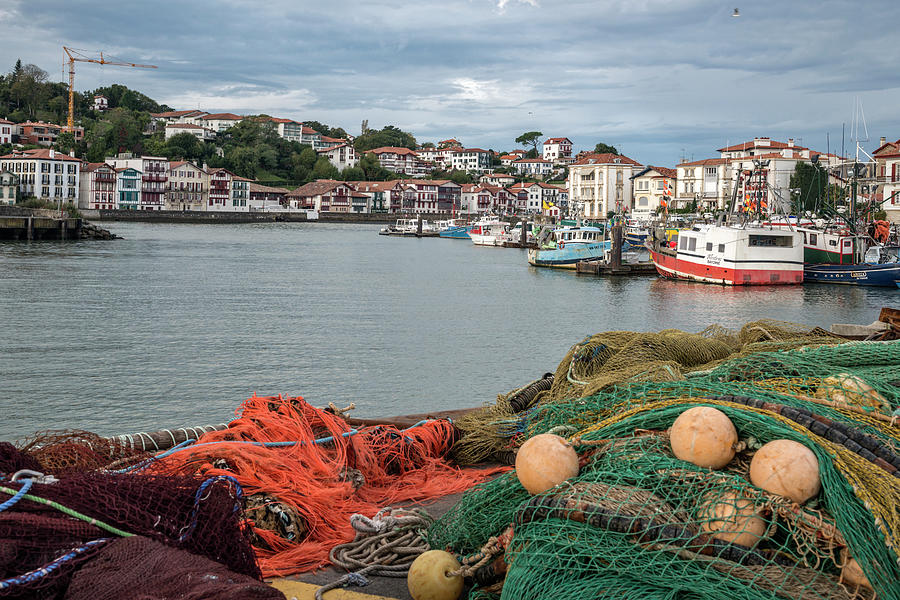Saint Jean De Luz And Fishing Nets Photograph by Izzet Keribar