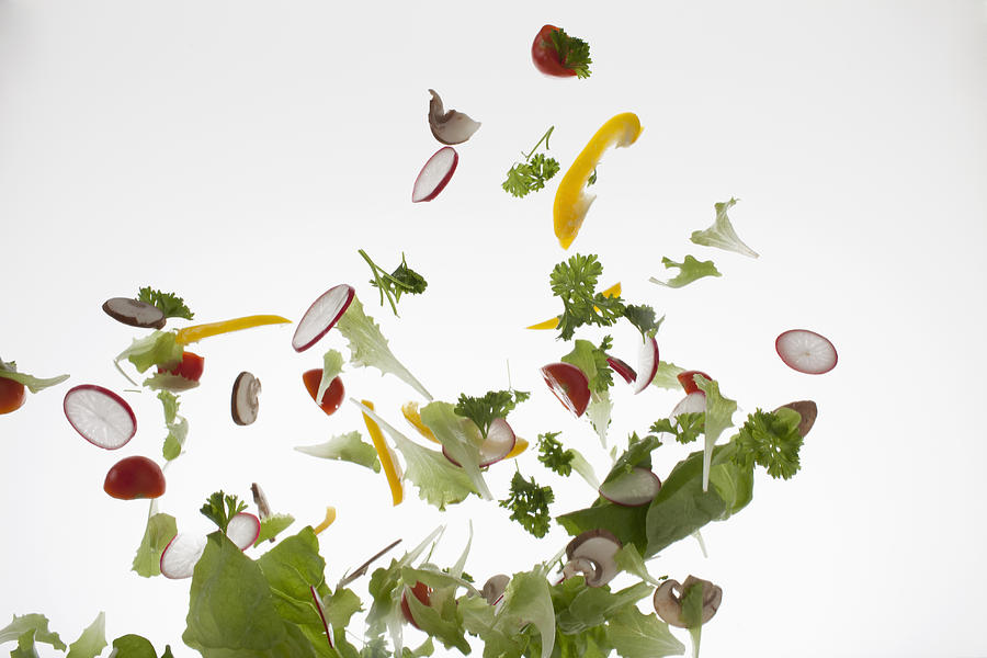 Salad against a white background Photograph by Dual Dual