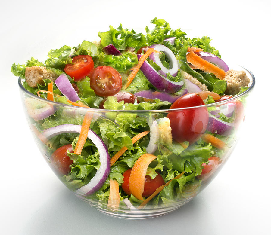 Salad in large glass bowl Photograph by ATU Images