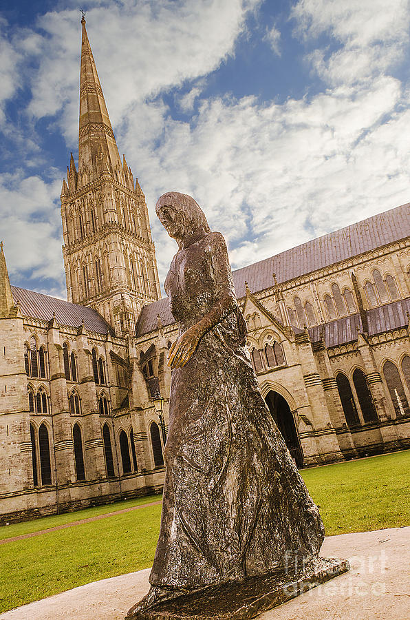 Salisbury Cathedral And The Walking Madonna Photograph by Linsey Williams