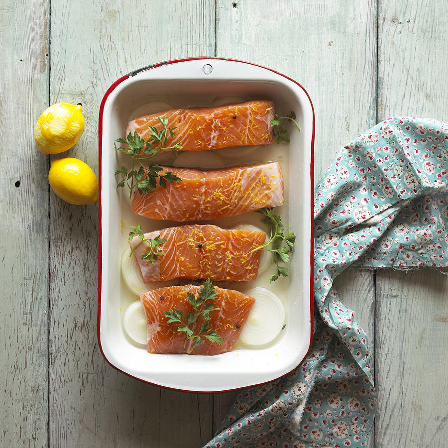 Salmon in a Baking Dish with Lemons Photograph by Annabelle Breakey