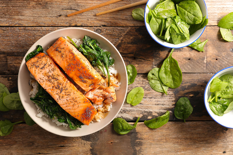 Salmon With Spinach And Rice Photograph by Margouillatphotos