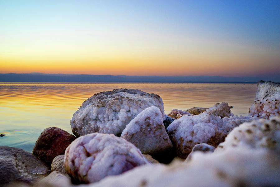 Saltcovered Rocks On Shore Of Dead Sea Photograph by Leslie Parrott