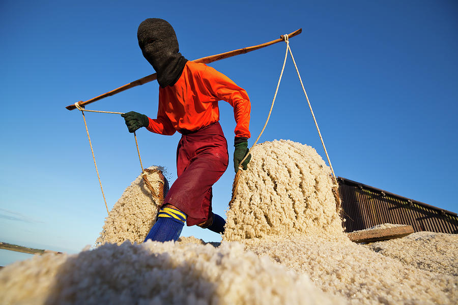 Salt Farm Worker, Thailand Photograph by Monthon Wa