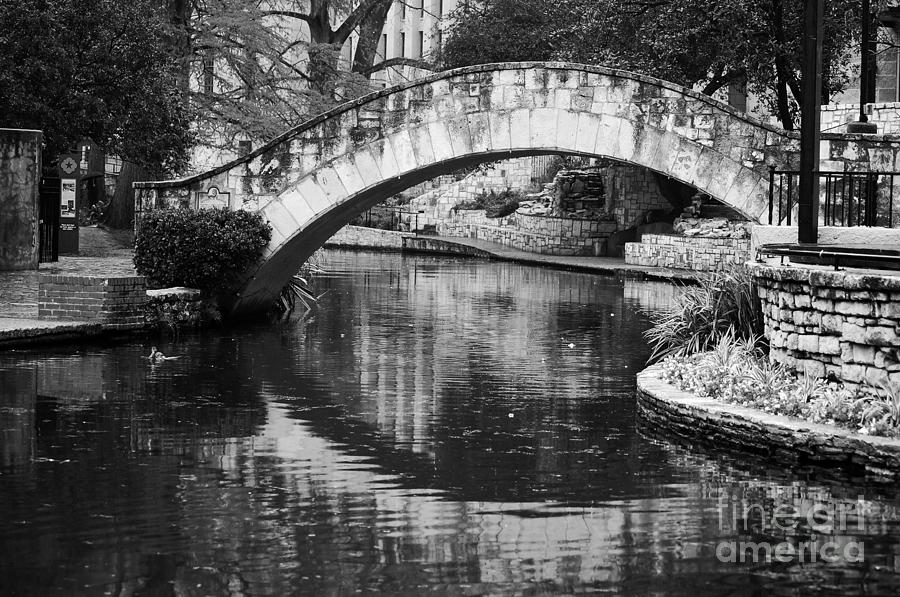 San Antonio Riverwalk Footbridge and Reflection Black and White Photograph by Shawn OBrien
