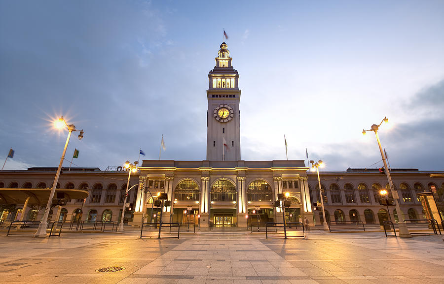 San Francisco ferry building entrance lined with tall lamps Photograph by Samvaltenbergs