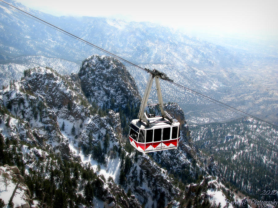 Sandia Tram Above the Snowy Peaks Photograph by Aaron Burrows
