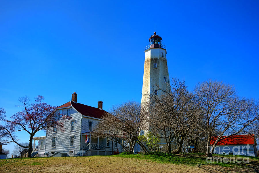 Sandy Hook Lighthouse and Keepers Quarters Photograph by Olivier Le Queinec