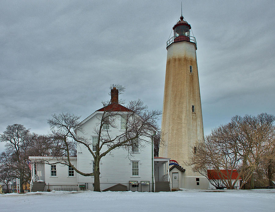 Sandy Hook Lighthouse in Winter Photograph by Steven Richman
