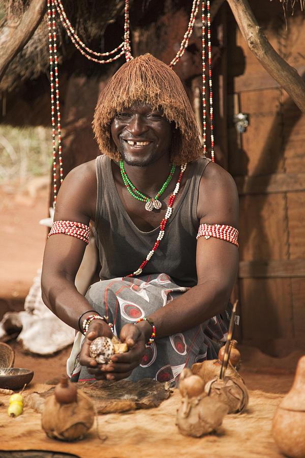Sangoma (traditional healer) throwing bones. Photograph by Martin Harvey