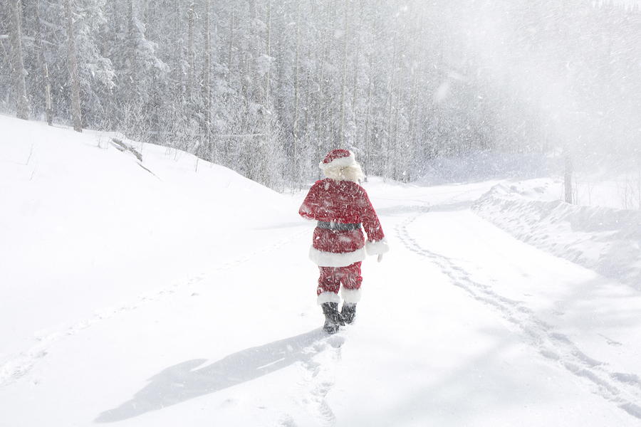 Santa Claus on a snowy roadway Photograph by Loridambrosio
