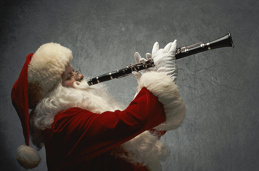 Santa Claus Playing Clarinet Photograph by GeoStock