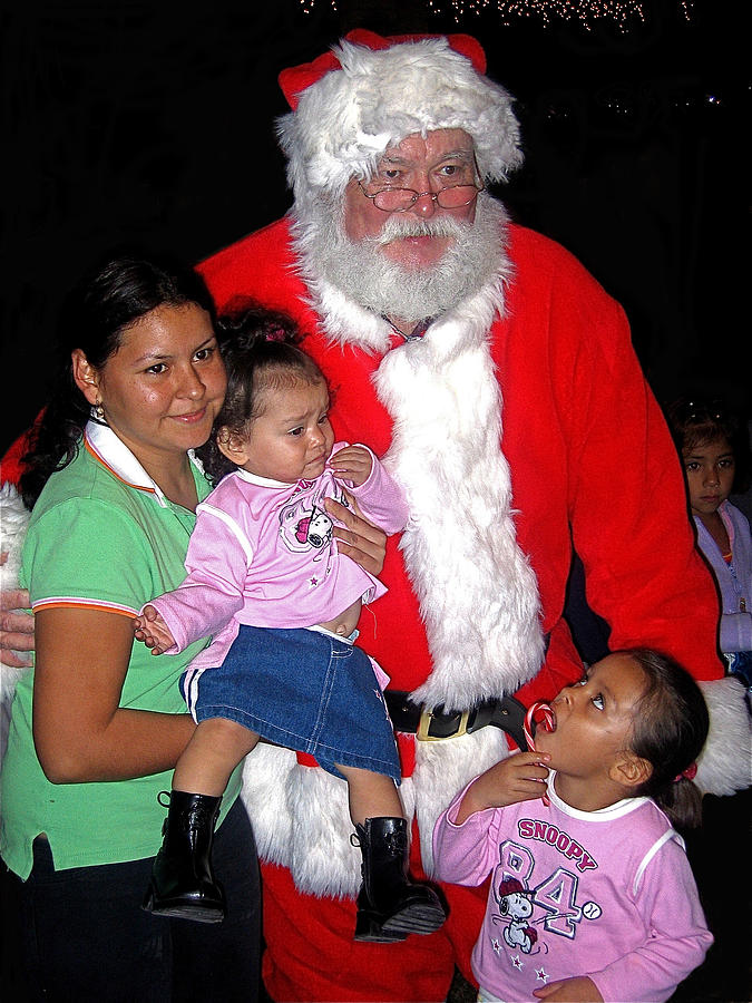 Santa Claus with Hispanic family Xmas parade Eloy Arizona 2004 Photograph by David Lee Guss