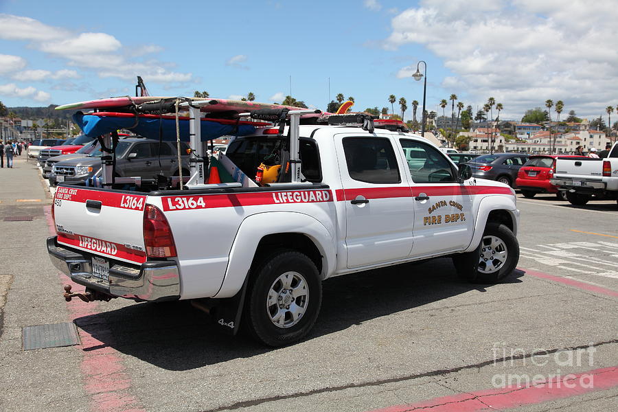 It Movie Photograph - Santa Cruz Fire Department Lifeguard Truck On The Municipal Wharf At Santa Cruz Beach Boardwalk Cali by Wingsdomain Art and Photography