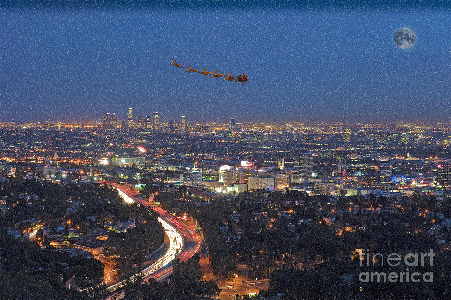 Santa Flying over Los Angeles Photograph by David Zanzinger