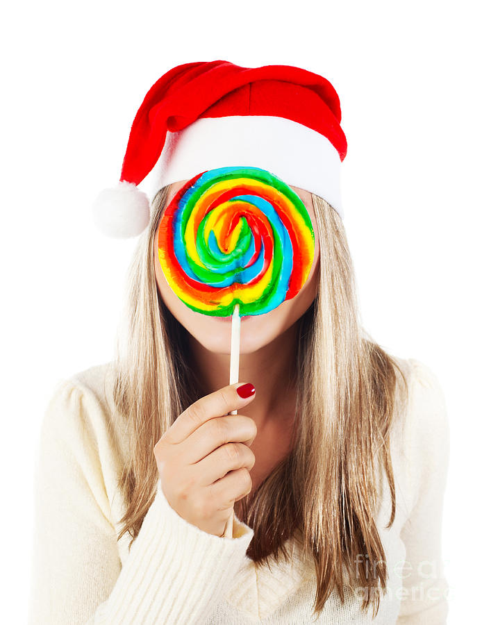 Santa girl eating lollipop Photograph by Anna Om