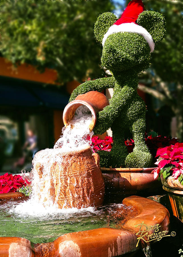 Santa Mickey Topiary Fountain Photograph by Doug Kreuger