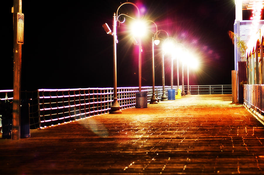 Santa Monica Pier at Night Photograph by Eric Benjamin