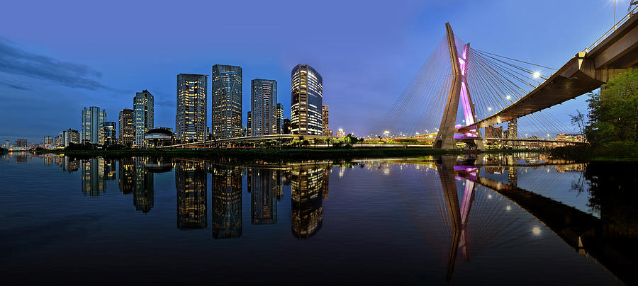 Sao Paulo skyline reflected on Pinheiros River at blue hour Photograph by Carlos Alkmin