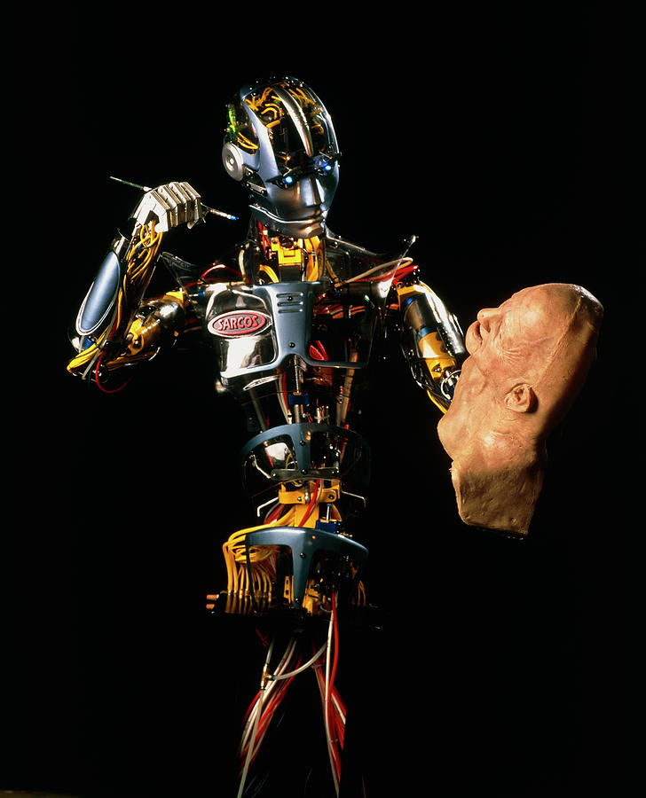 Sarcos Android Robot Paints A Life-like Robot Mask Photograph by Peter Menzel/science Photo Library