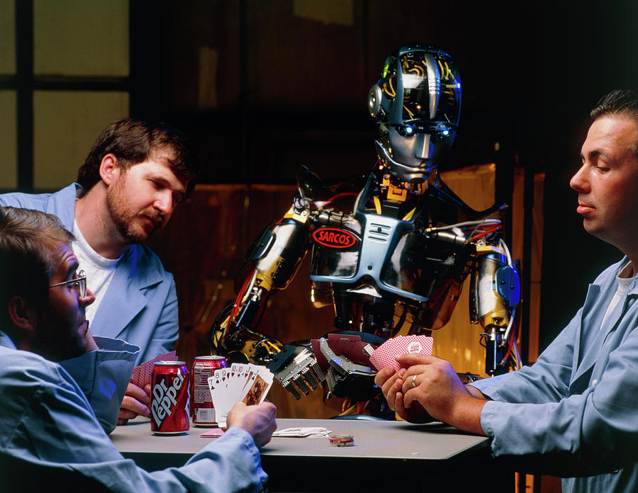 Sarcos Android Robot Plays Cards With Engineers Photograph by Peter Menzel/science Photo Library