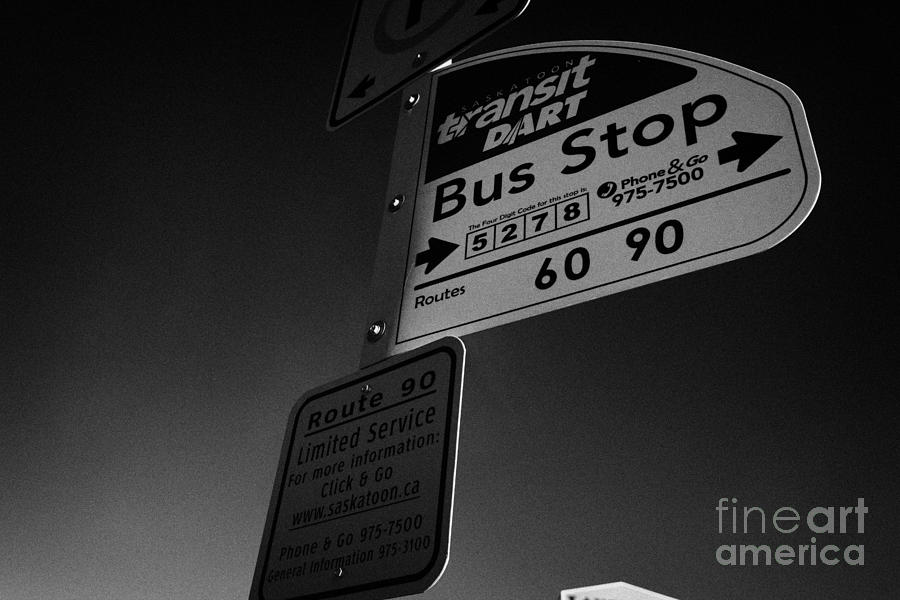 Transportation Photograph - Saskatoon transit dart bus stop with text code for bus information Saskatchewan Canada by Joe Fox