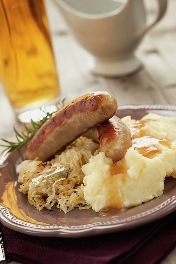 Sausages And Sauerkraut Photograph by Gmvozd