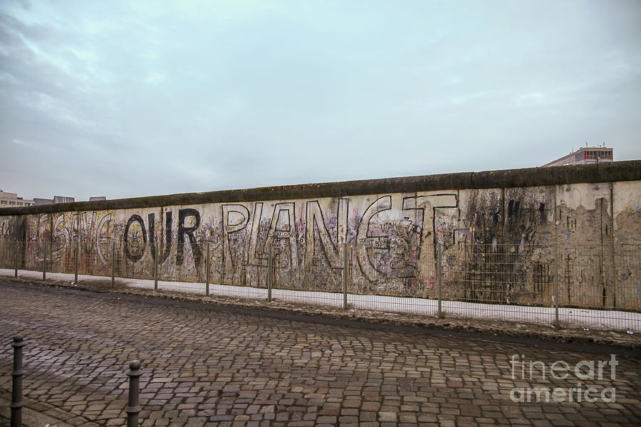 Berlin Photograph - Save our planet on the Berlin wall by Patricia Hofmeester