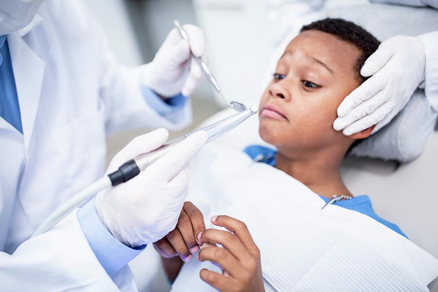 Scared Boy Looking At Dental Drill Photograph by Science Photo Library ...