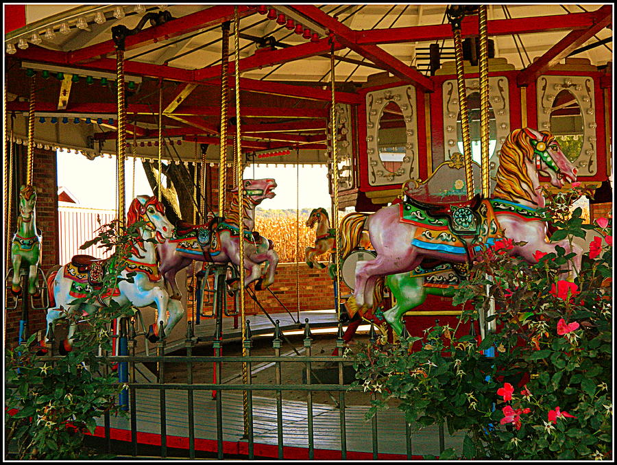 Scary Carousel Horses Photograph by Kathy Barney