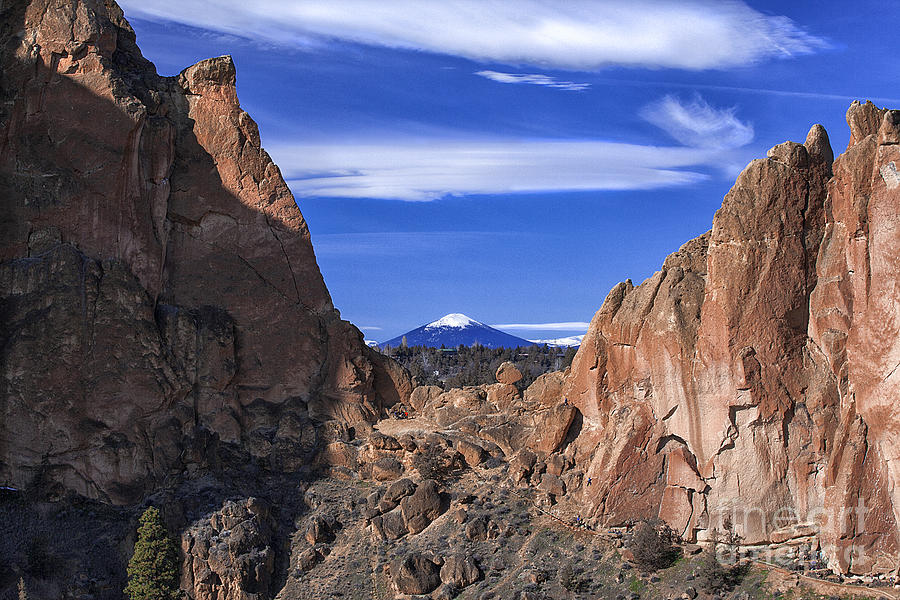 Scenic Blue Sky View Between Smith Rock Mountain Rugged Cliffs Photograph by Jerry Cowart