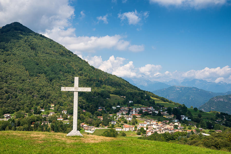 Scenic landscape with little village hill and cross in Switzerland Photograph by Matthias Hauser