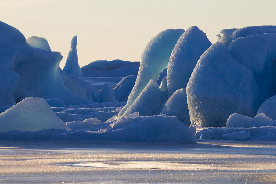 Sunset Photograph - Scenic Of Large Blue Iceberg Formations by Milo Burcham