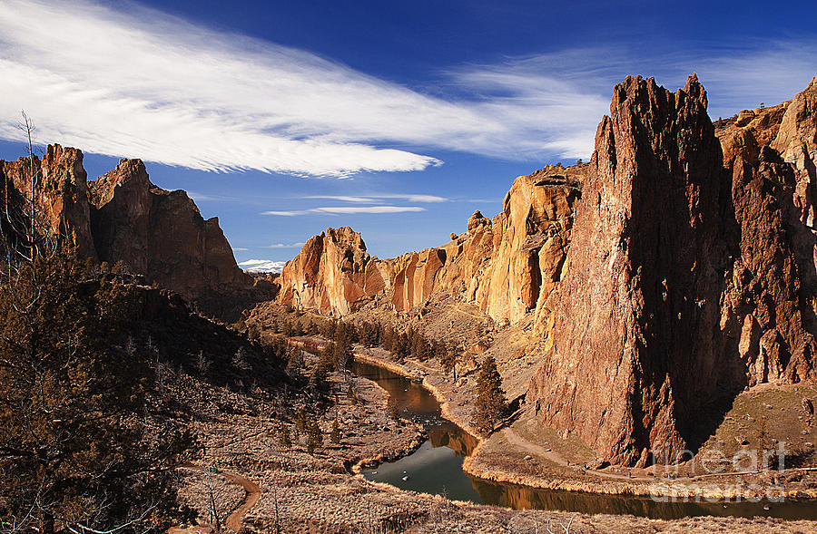 Scenic Smith Rock Mountains With Rugged Cliffs Flowing River Photograph by Jerry Cowart