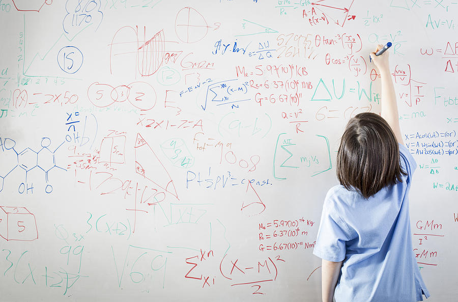Schoolgirl In Front Of Wipe Board, Math Equations Photograph by Jw Ltd