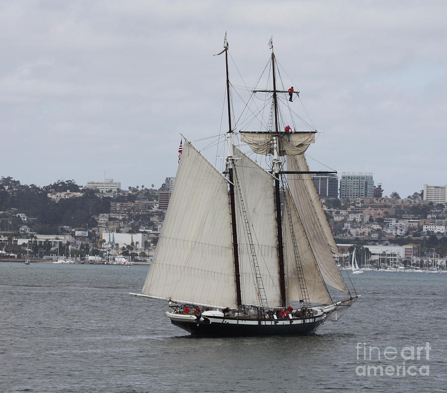 Schooner heading out to the Ocean Photograph by John Telfer