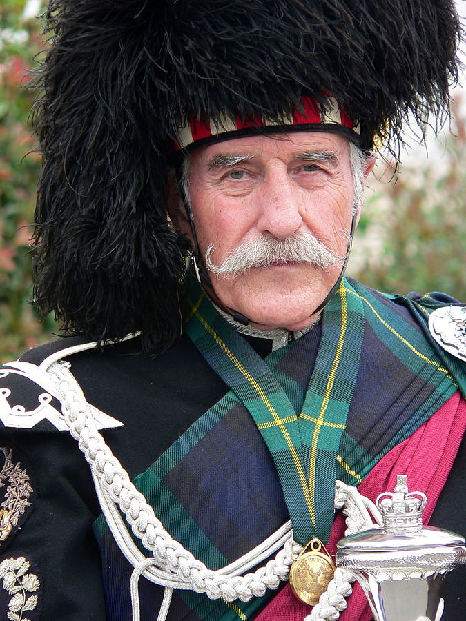 Scotsman in Regalia Photograph by Jeff Lowe
