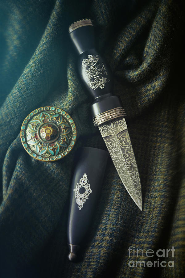 Scottish dirk and celtic pin brooch on plaid Photograph by Sandra Cunningham
