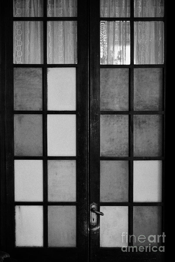 Paris Photograph - screen door in traditional old house in the barrio paris londres Santiago Chile by Joe Fox