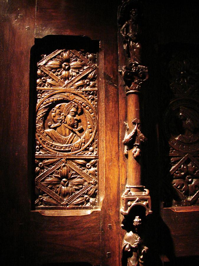 What is behind the Sculpted Door Photograph by Cristina Stefan
